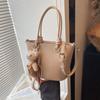 Comercio exterior este año popular estilo extranjero bolso de cubo portátil para mujer 2025 nueva moda bolso pequeño trabajo bandolera