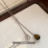 2026 Nuevo Estilo Collar Deslizante de Piedra Ojo de Tigre, Cadena Larga para Suéter de Mujer, Accesorio de Lujo Ligero de Nicho, No se Desvanece