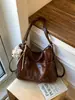 Bolsa de dumplings de gran capacidad para mujer, nuevo diseño de nicho vintage 2026, bolso de hombro cruzado, mochila multifuncional