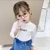 Primavera 2026 Nuevo Estilo Camiseta Básica de Moda Casual Simple para Niñas Fresca y Linda Estilo Coreano Diario Top Individual