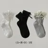 Calcetines para niños para otoño e invierno con bordes rizados y lazos, adecuados para niñas y bebés, estilo Lolita, calcetines de media pantorrilla sin presión