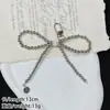Chic Coreano Nuevo Estilo Dulce Lazo de Perlas Colgante de Corazón Plateado Llavero de Coche Encanto para AirPods Accesorio de Teléfono