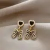 Pendientes de Lazo de Perla Amorosos Pendientes de Gama Alta 2025 Nuevos Pendientes de Diseño de Nicho de Moda