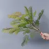 Plantas verdes artificiales en stock, manojos de helecho, hojas de helecho, hierba de helecho para decoración de paredes interiores y diseño de paisajes, césped artificial al por mayor