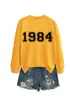 Amazon eBay sitio independiente casual simple cómodo mujer 1984 digital otoño e invierno nuevo cuello redondo manga larga sudadera