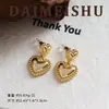 Pendientes Geométricos de Corazón Metálico Brillante Versátiles de Moda Minimalista Europeo y Americano con un Toque de Lujo Ligero y de Alta Gama, Pendientes de Aguja Plateada para Mujer