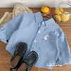Camisa de Manga Larga para Niños Estilo Primavera y Otoño 2026 Nuevo Estilo Fresco Ropa de Primavera Chaqueta Informal Camisa Rayada Azul para Niños