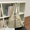 Mochila de cordão minimalista estilo japonês transfronteiriça, casual e versátil, adequada para estudantes, aulas, yoga, com múltiplas opções de transporte, pode também ser usada como bolsa de ombro