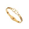 Pulsera de titanio de acero de oro rosa de 18k de venta caliente en línea, pulsera de moda para pareja hueca con incrustaciones de diamantes de oso para mujer, joyería al por mayor