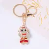 Lindo Llavero Zodiaco Buey con Pedrería Aleación de Zinc Dibujo Animado Ternero Colgante para Bolso Mochila Llavero de Coche Regalo
