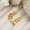 Nuevo Pendiente de Tachuela de Hielo Triturado Chino Llamativo Caballo Pequeño Moneda de Cobre Soporte para Espiral Antimosquitos Clip para Oreja Sin Perforación Oreja Pendientes de Lujo Ligero Accesorios para Oreja Mujer