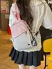 Mochila pequena portátil versátil para estudantes homens de grande capacidade em duas cores, bolsa de peito cruzada simples estilo japonês para mulheres
