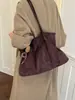 Bolso tote de gamuza para mujer 2026 nuevo modelo nicho retro diario para ir al trabajo bolso de hombro de gran capacidad bolso de mano