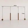 Estante de ropa de acero inoxidable montado en la pared para tienda de ropa, estante vintage color veta de madera de nogal, exhibidor de piso para ropa de mujer