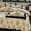 Estilo Hepburn Francés 2025 Nuevo Juego de Cuatro Piezas Algodón Puro Floral Retro Encaje Negro Funda Nórdica Ropa de Cama Venta al por Mayor