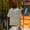 Verão 2026 Novo Masculino Tendência Moda Manga Curta Estampa Colorida Luxo Mais Vendido Solto Top Ins