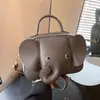 Nuevo bolso de mano de nicho de dibujos animados creativos con forma de elefante transfronterizo para mujer, bolso de hombro cruzado lindo, monedero para mujer
