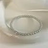 Pulsera de Zirconia y Perla de Lujo Ligero para Mujer Diseño de Nicho Pulsera Elástica de Perlas Elegante Versátil Regalo Fábrica de Anillos Venta al por Mayor