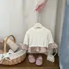Blusa Feminina Patchwork Falsa de Duas Peças Primavera e Outono 2025 Camiseta de Manga Longa Estilosa para Bebê Camisa Base Estilo Moda Coreana