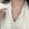 Collar Vintage con Colgante de Corazón Dorado con Diamantes, Cadena Exquisita para la Clavícula de Lujo Ligero, Accesorio de Alto Valor y que Realza el Tono de Piel