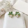 Pendientes Coreanos y Japoneses de Nuevo Estilo Chino con Flores de Esmalte Frescas para Mujer, Suaves y Elegantes, Diseño de Nicho con un Toque de Alta Gama