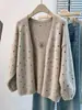 Abrigo suéter grueso de lunares gris retro, nueva colección otoño/invierno 2026, manga de farol, corte holgado, cárdigan de punto casual para mujer