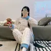 Fábrica fuente pijama nuevo de manga larga de forro polar coral para mujer otoño e invierno franela gruesa invierno conjunto para estar en casa