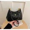 Bolso de hombro cruzado de moda y chic estilo coreano transfronterizo con patrón de diamantes bordado texturizado simple nuevo y moderno 2026