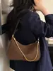 Bolso de hombro de diseño de nicho nuevo, bolso cruzado de alta calidad, bolso de hombro versátil y elegante, bolso de axila moderno para el día a día