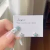 Brincos de Tarraxa Estrela Cheios de Diamante Estrela Branca Strass Azul Gelo Estrela de Cinco Pontas Nicho Requintado Pequeno Compacto Versátil para o Dia a Dia Brincos de Luxo Leve