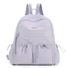 Mochila para Mulheres 2026 Estilo Quente Grande Capacidade Impermeável Versátil Mochila de Viagem Mochila para Estudante Universitário Bolsa Escolar Bolsa Leve de Nylon