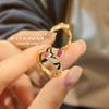 Anillo vintage pequeño de mediados de la antigüedad de lujo ligero de alta calidad esmalte negro vidriado de goteo chapado en oro corindón rojo retro francés femenino