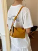 Essenciais para o Trajeto Super Quentes Bolsa Tote Pequena Feminina 2026 Nova Verão Nicho Textura Trançada Bolsa de Ombro Único Bolsa Transversal para o Trajeto