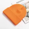 Venta al por mayor del fabricante Gorro cálido de moda para otoño e invierno, Gorro de punto a prueba de frío, Color sólido para exteriores, Protección para las orejas, Gorro de lana, Logotipo bordado