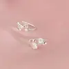 Brincos de flor de ameixa em prata pura s999 para mulheres, estilo de luxo leve e de alta qualidade, novos fechos de orelha, brincos versáteis de nicho para cuidados com o piercing, atacado