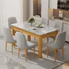 Conjunto de mesa de jantar e cadeiras em ardósia estilo nórdico, design simples, formato retangular, estrutura de ferro com acabamento em madeira sintética, adequado para uso doméstico, ideal para apartamentos pequenos