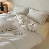 Juego de cuatro piezas de algodón y lino de color liso Clase A, funda de edredón jacquard abotonada simple de algodón puro, sábana, sábana bajera, ropa de cama para todas las estaciones