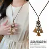 Collar Largo Colgante Estilo Étnico Retro Lujo Accesible Nicho Cadena de Suéter de Gama Alta Joyería Elegante Versátil Personalizada para Mujeres