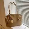 2024 Invierno Nuevo Estilo Retro Flojo Trabajo Hombro Axila Bolso de Viajero Casual Simple Portátil Bolso Tote