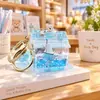 Llavero de botella flotante para velero marino con aceite en su interior, exquisitos adornos para mochila escolar infantil, llavero para llaves de coche, colgante para pareja