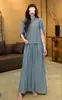 Conjunto de Duas Peças para Mulheres: Blusa de Tricô Lyocell Roxo Suave com Punhos Curvos e Cintura Elástica, Saia Longa Franzida