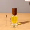Botella dispensadora de perfume puntual 20 ml Botella vacía Tapa de madera Botella con atomizador Presionar Vidrio cosmético Botella de perfume de rosca