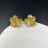 Aretes de tuerca de temperamento simple de alta gama con circonita incrustada de plata S925 chapada en oro real de cobre con flores estilo lujo ligero