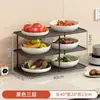 Suporte multifuncional de vários níveis para preparação e armazenamento de utensílios de cozinha, incluindo tigelas, pratos, panelas quentes, travessas e legumes.
