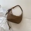Bolsa de ombro única estilo coreano de nicho com textura retrô fashion 2026 Nova chegada de outono para trabalho e deslocamento bolsa de axila de grande capacidade moderna
