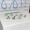 Coleção de Unhas de Osso de Ouvido de Aço Titânio Verde Menta Transparente Pequenas Frescas Microcravejadas com Zircônia Doces Brincos de Trevo de Quatro Folhas