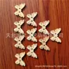 Hebilla de madera de animal de dibujos animados transfronteriza 17*24 mm botón de mariposa hebilla de tronco accesorios de ropa DIY al por mayor en stock