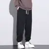 Calça casual masculina primavera calça de moletom plus size solta versátil extra grande tornozelo amarrado Esportiva calça masculina primavera e outono