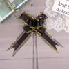 Transfronterizo 50 gran tinta borde dorado hilo de nieve lazo de mano flor de arrastre coche de boda regalo de Navidad empaque de flores flor de arrastre