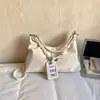 Bolsa Transversal de Nicho da Moda para Mulheres, Novo Modelo de Primavera, Bolsa de Ombro Simples para o Dia a Dia, Bolsa Saco Versátil Casual de Alta Qualidade